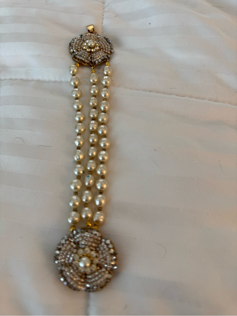 Miriam Haskell Cream Pearl Triple-Strand Bracelet with Beaded Floral Clasps